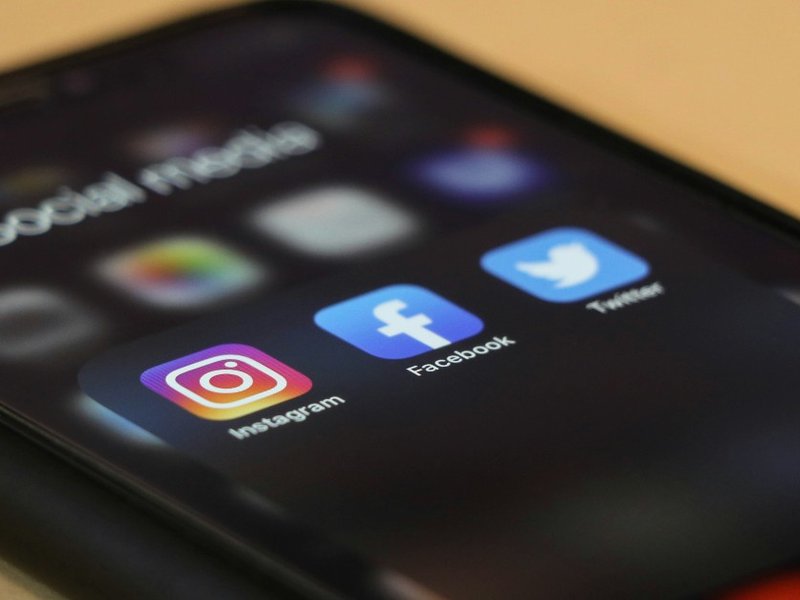 Social media icons on a phone screen