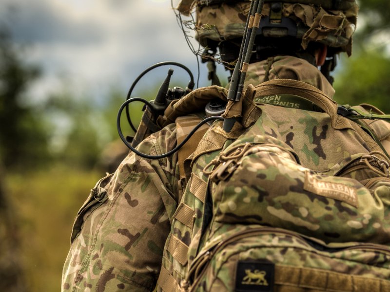 An image of a British soldier in military fatigues.