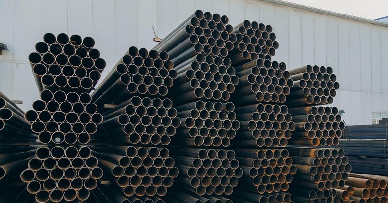 Steel pipes outside a factory