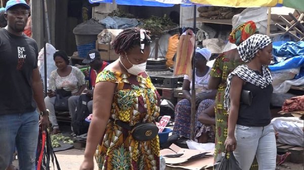 woman_wearing_a_surgical_mask_in_brazzaville_-_covid_19.jpg